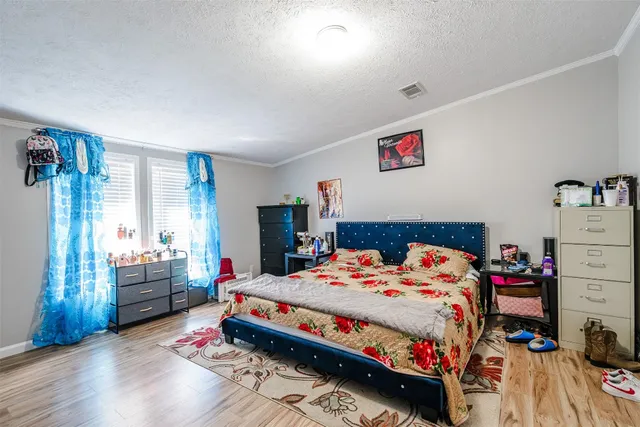 a kitchen with a refrigerator and sink