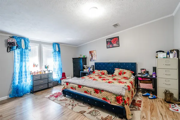 a kitchen with a refrigerator and sink