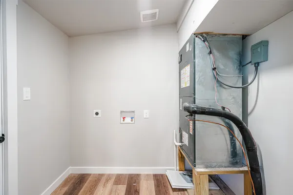 a view of staircase with washer and dryer