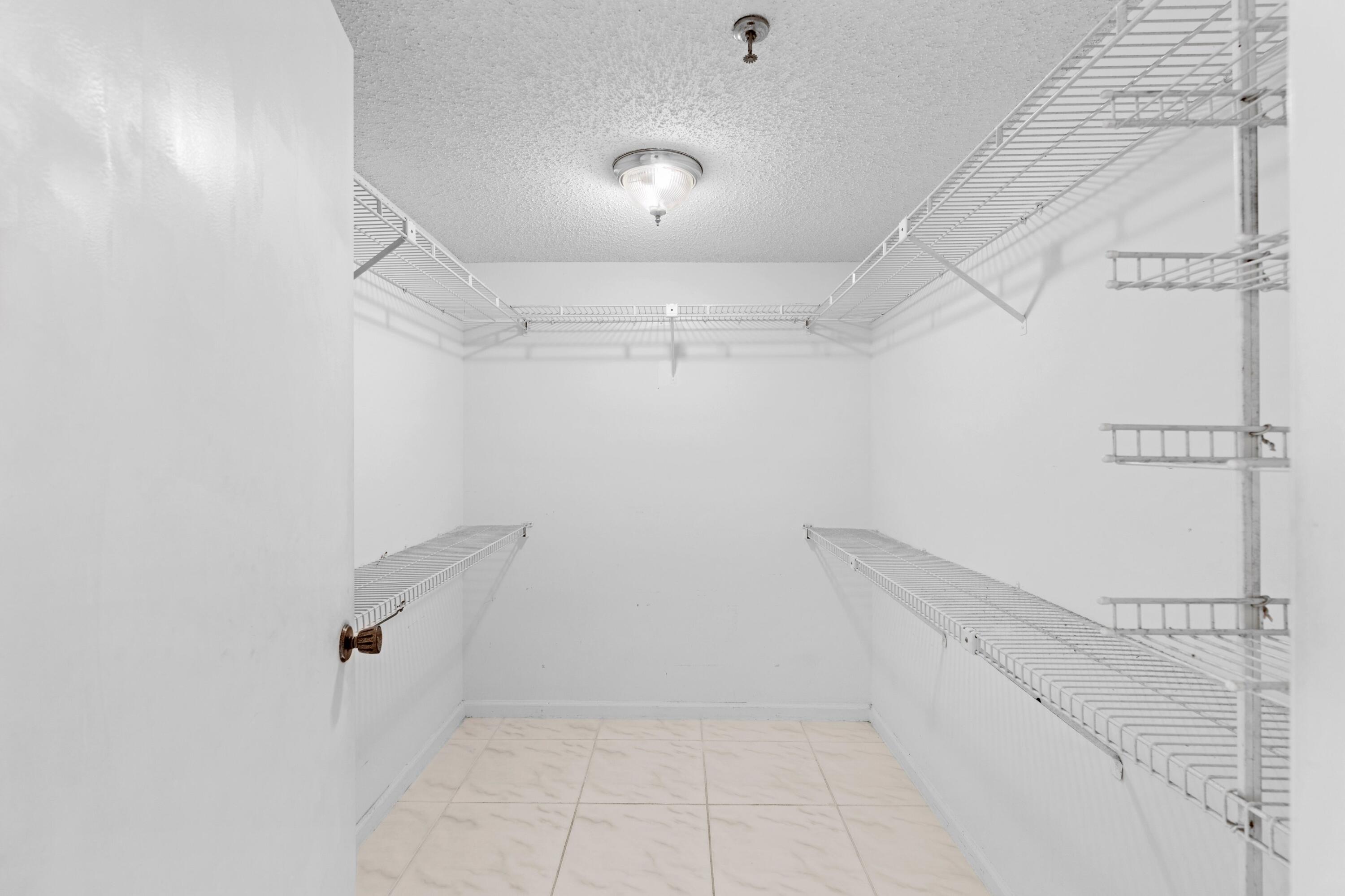 9170 Southwest 14th Street, Unit 4108 Boca Raton, FL 33428 - Photo 13 of 44 Primary Bedroom