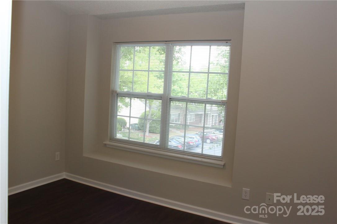 17013 Turning Stick Court Charlotte, NC 28213 - Photo 12 of 27 an empty room with a window