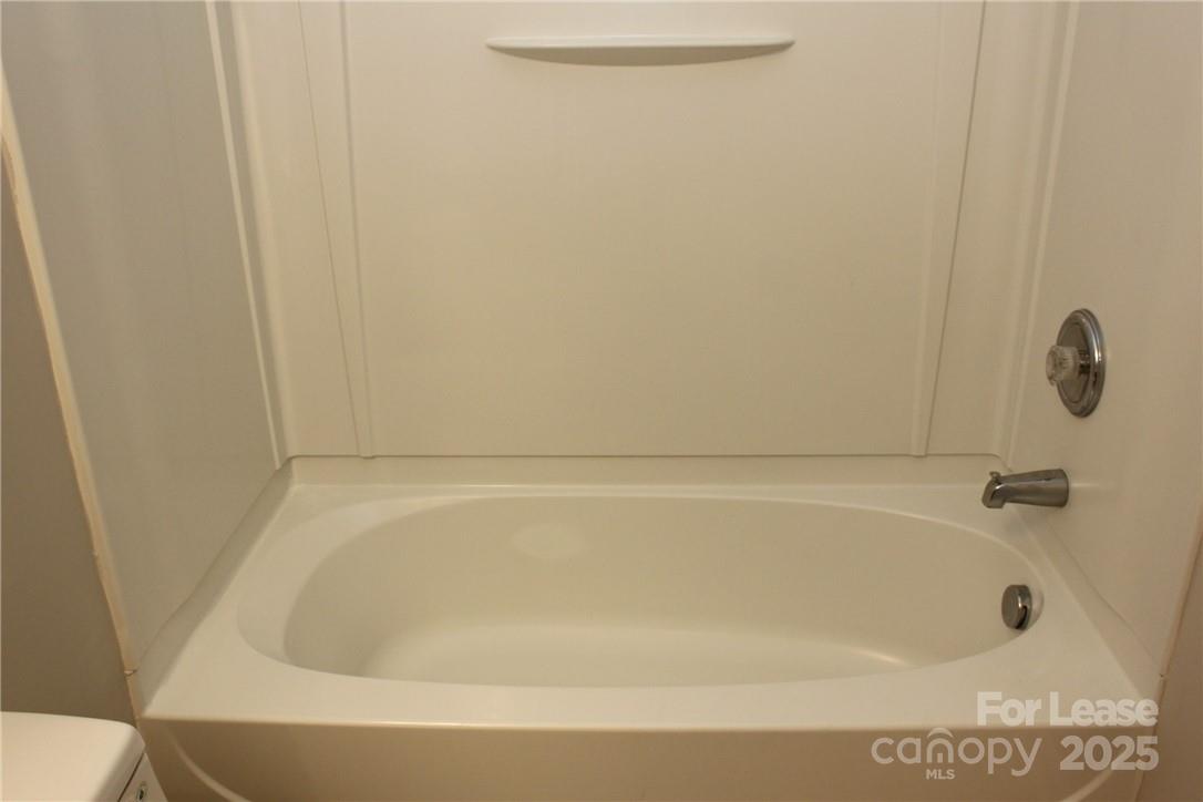 17013 Turning Stick Court Charlotte, NC 28213 - Photo 14 of 27 a bathroom with a bathtub