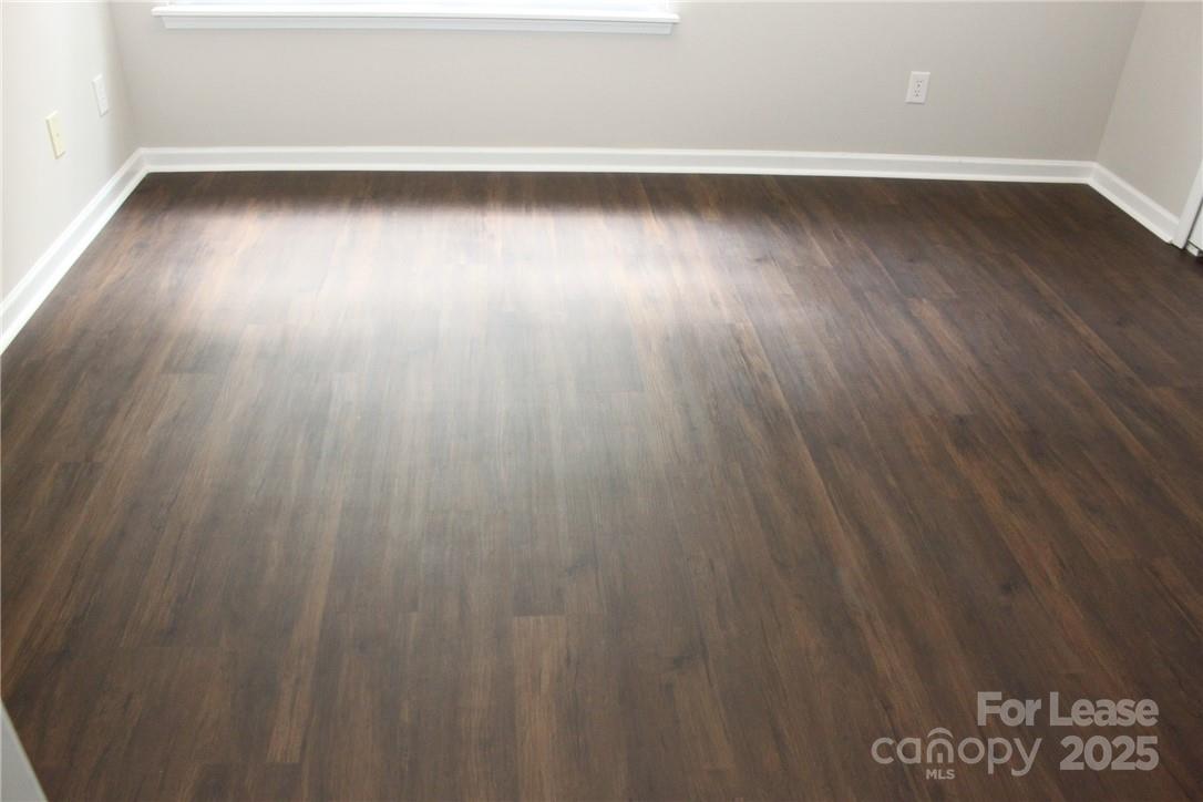 17013 Turning Stick Court Charlotte, NC 28213 - Photo 21 of 27 a view of a room with wooden floor