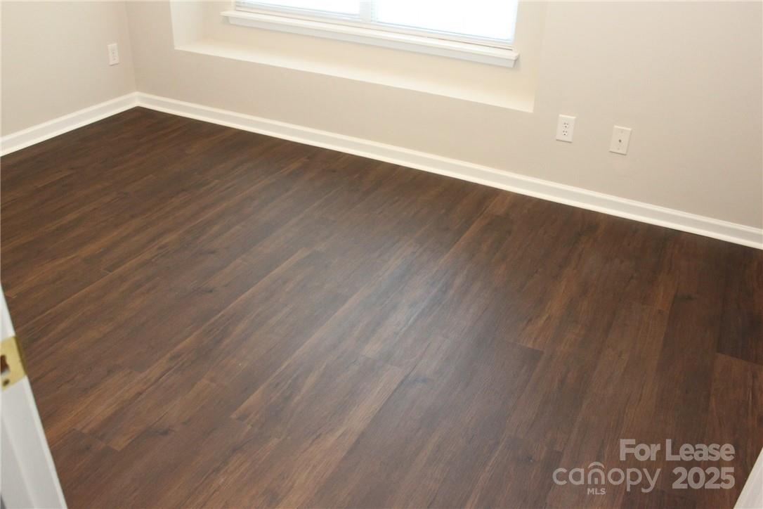17013 Turning Stick Court Charlotte, NC 28213 - Photo 10 of 27 a view of a room with wooden floor