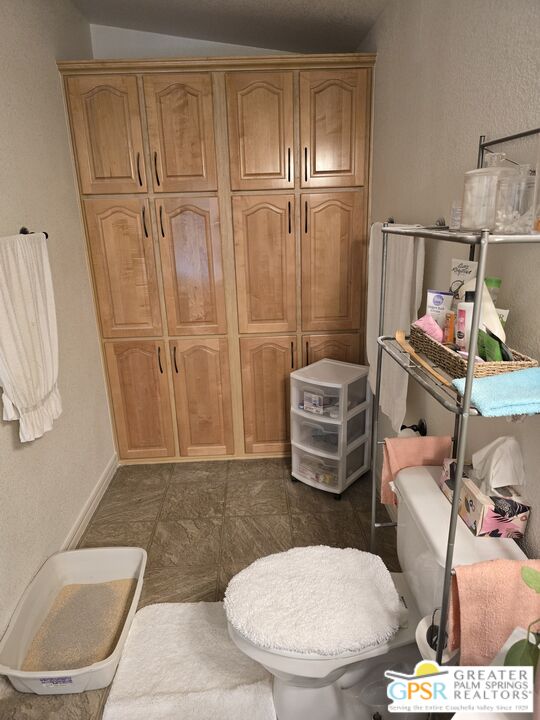 26012 Chelsea Way Hemet, CA 92544 - Photo 17 of 27 a bathroom with a toilet and a shower