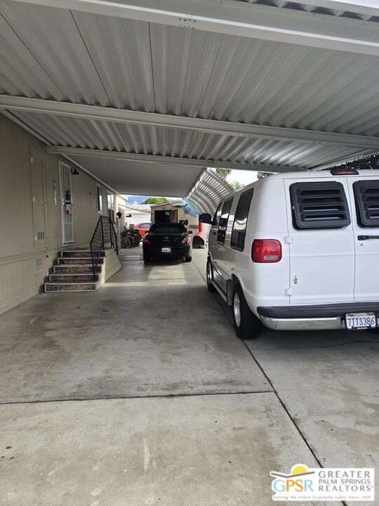 26012 Chelsea Way Hemet, CA 92544 - Photo 22 of 27 a view of parking garage with cars parked