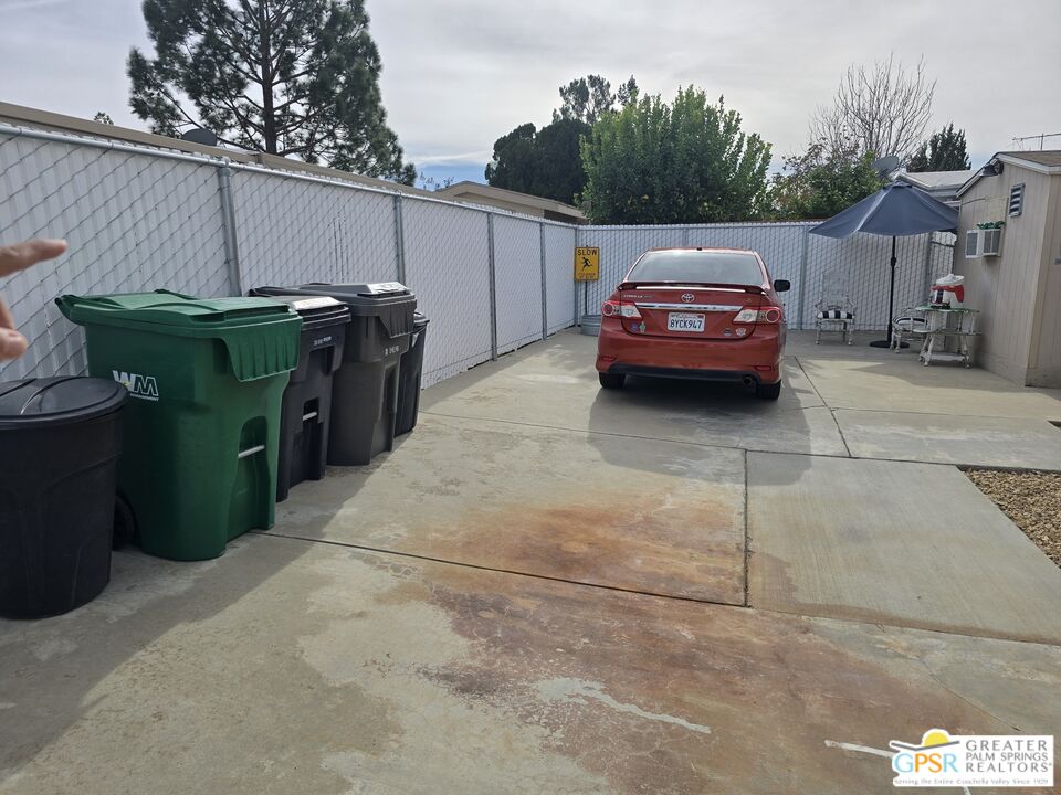 26012 Chelsea Way Hemet, CA 92544 - Photo 23 of 27 a view of a car parked in garage