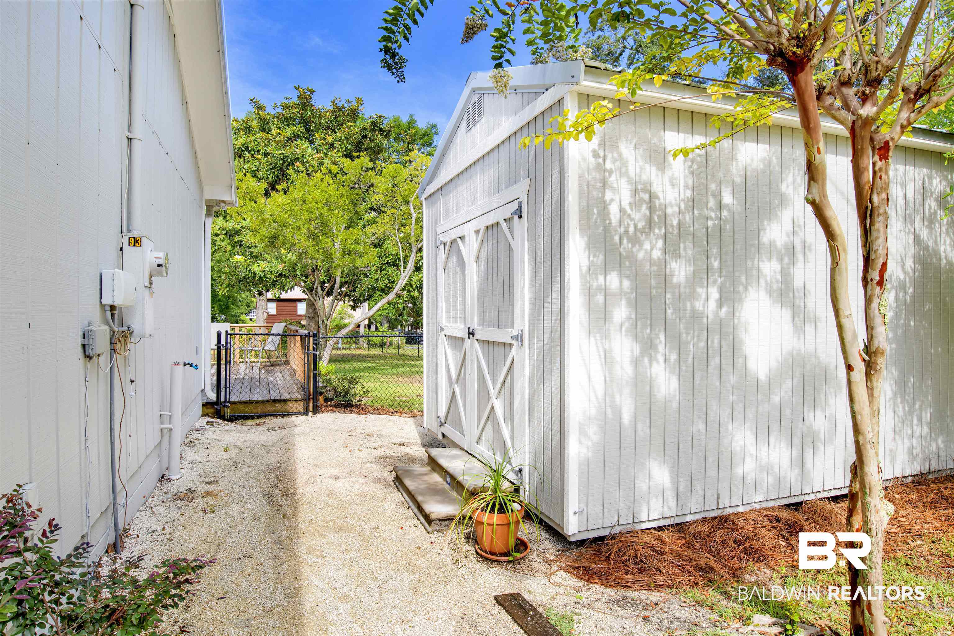 5415 Greentree Road Orange Beach, AL 36561 - Photo 40 of 55 View of shed featuring a gate
