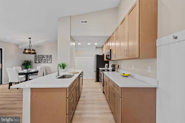 a kitchen with a sink a counter top space