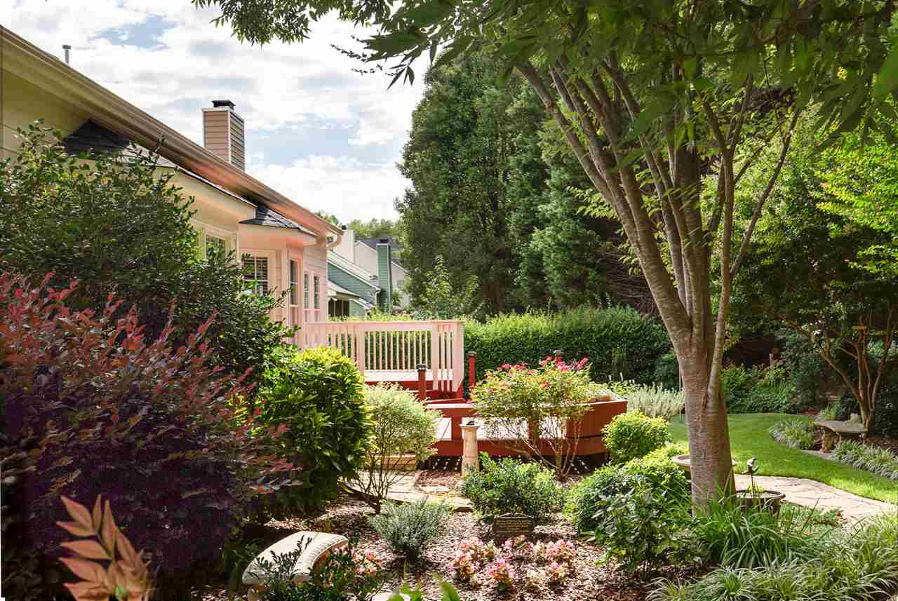 4008 Batiste Road Raleigh, NC 27613 - Photo 22 of 24 Beautiful back yard with extensive plants Back yard