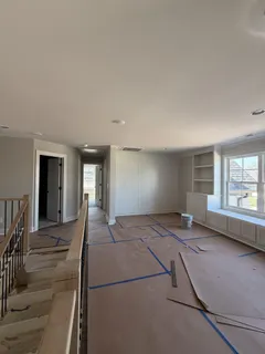 a view of a livingroom with a furniture