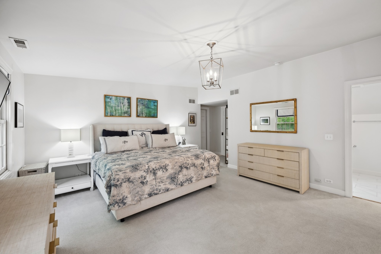 269 Locust Road Winnetka, IL 60093 - Photo 16 of 26 a bedroom with a bed and a dresser