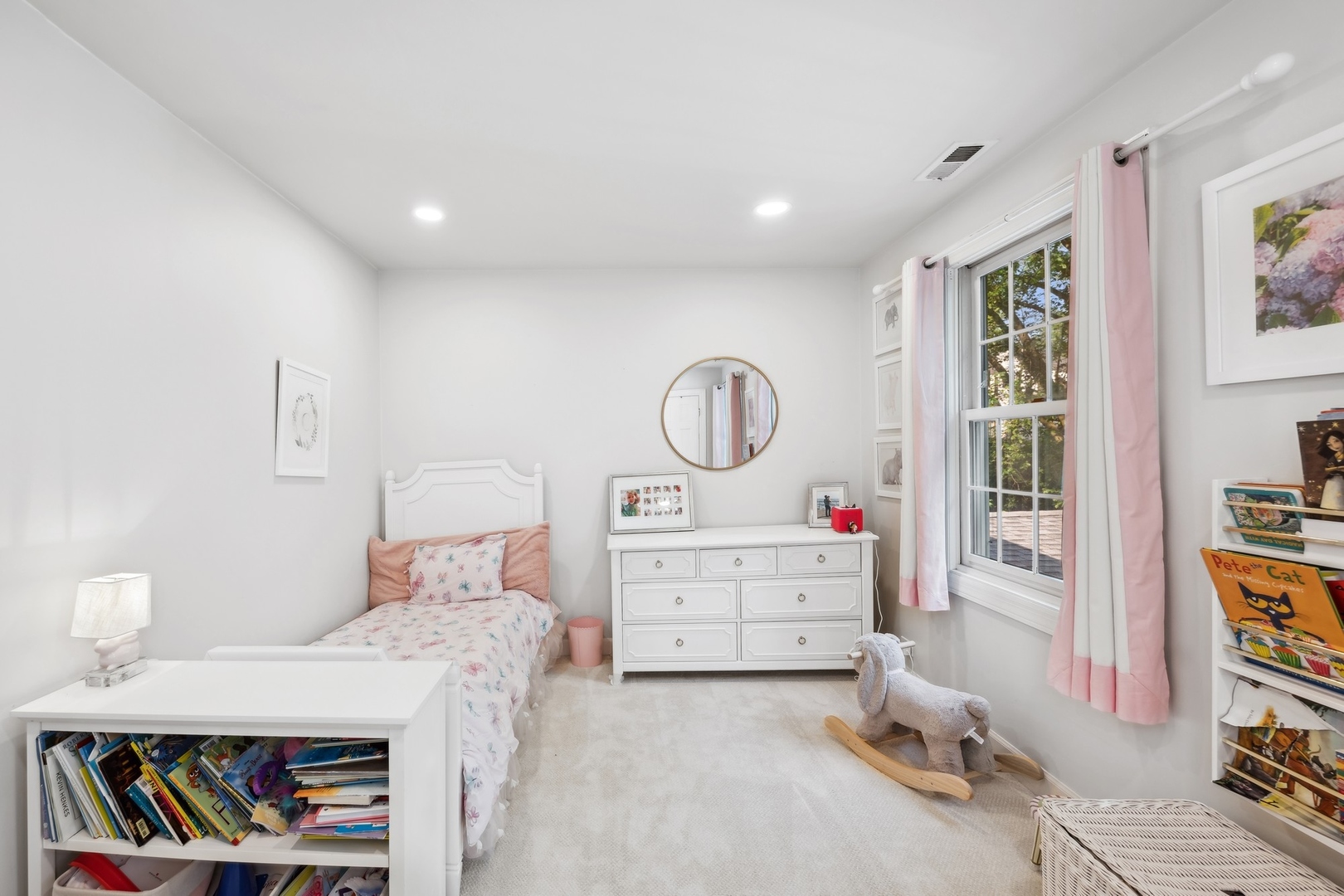 269 Locust Road Winnetka, IL 60093 - Photo 20 of 26 a bedroom with a bed and a cabinets