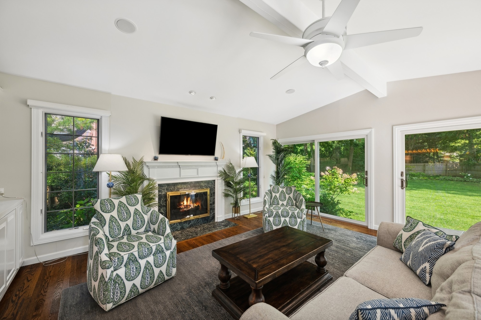 269 Locust Road Winnetka, IL 60093 - Photo 5 of 26 a living room with furniture fireplace and flat screen tv