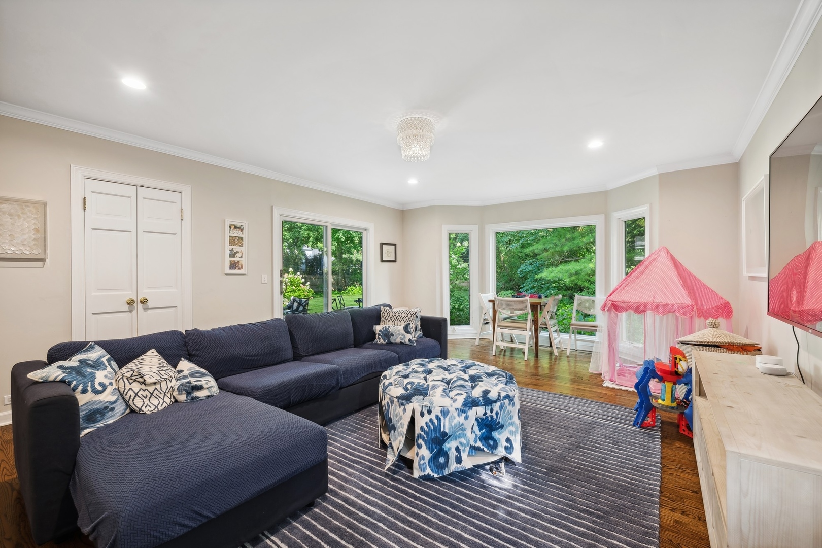 269 Locust Road Winnetka, IL 60093 - Photo 9 of 26 a living room with furniture and a large window