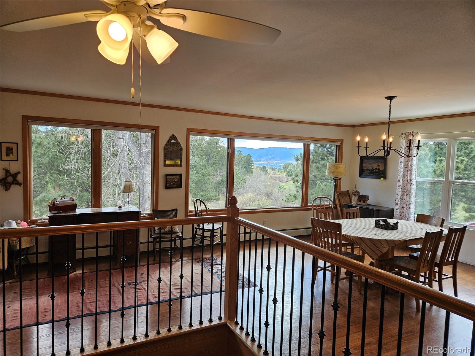 18475 West Road Monument, CO 80132 - Photo 16 of 25 a view of a dining room with furniture window and outside view