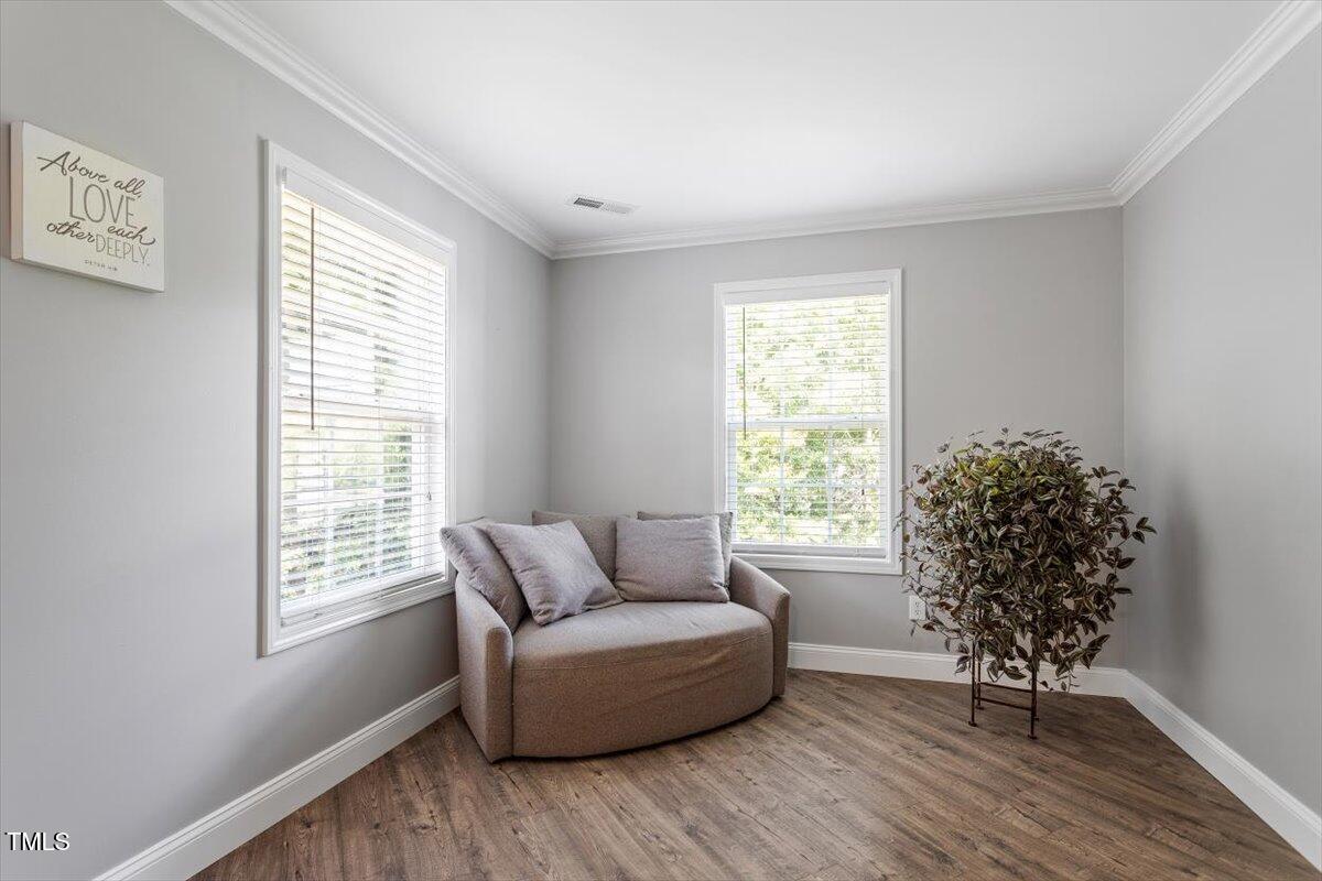 308 Mickleson Ridge Drive Raleigh, NC 27603 - Photo 28 of 51 a living room with furniture and a window