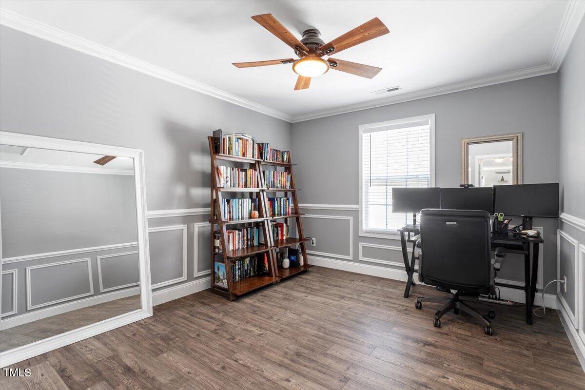 308 Mickleson Ridge Drive Raleigh, NC 27603 - Photo 33 of 51 a view of a workspace with furniture and a window