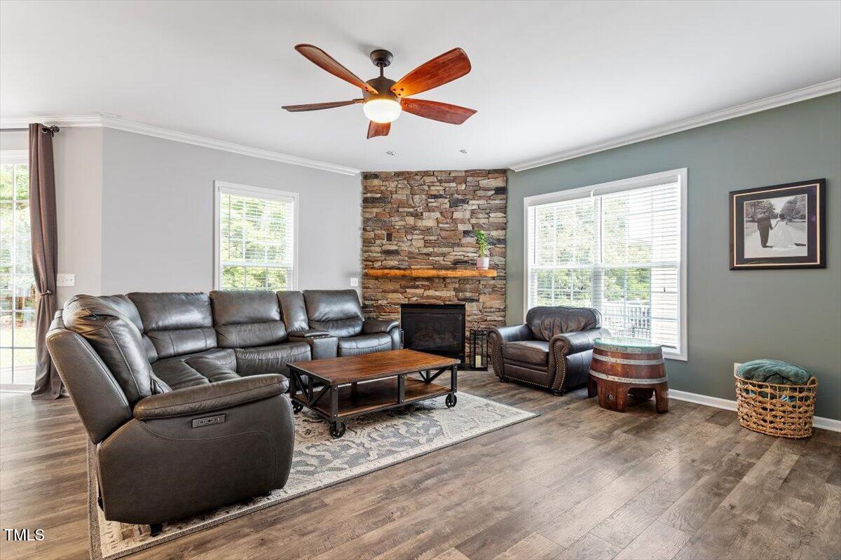 308 Mickleson Ridge Drive Raleigh, NC 27603 - Photo 9 of 51 a living room with furniture and a large window