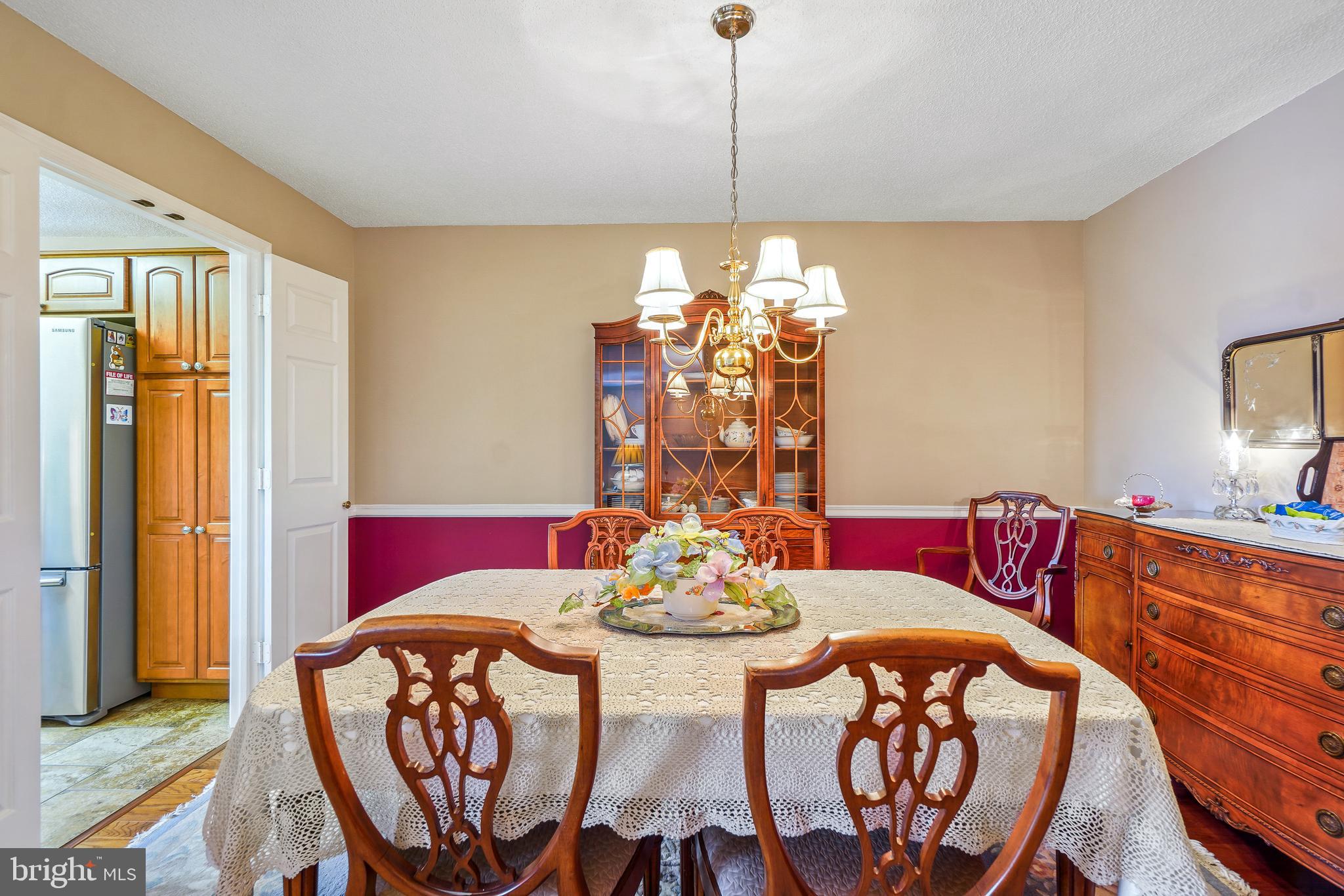 14801 Pennfield Circle, Unit 302 Silver Spring, MD 20906 - Photo 11 of 45 Separate dining room w/ chair rail moldings
