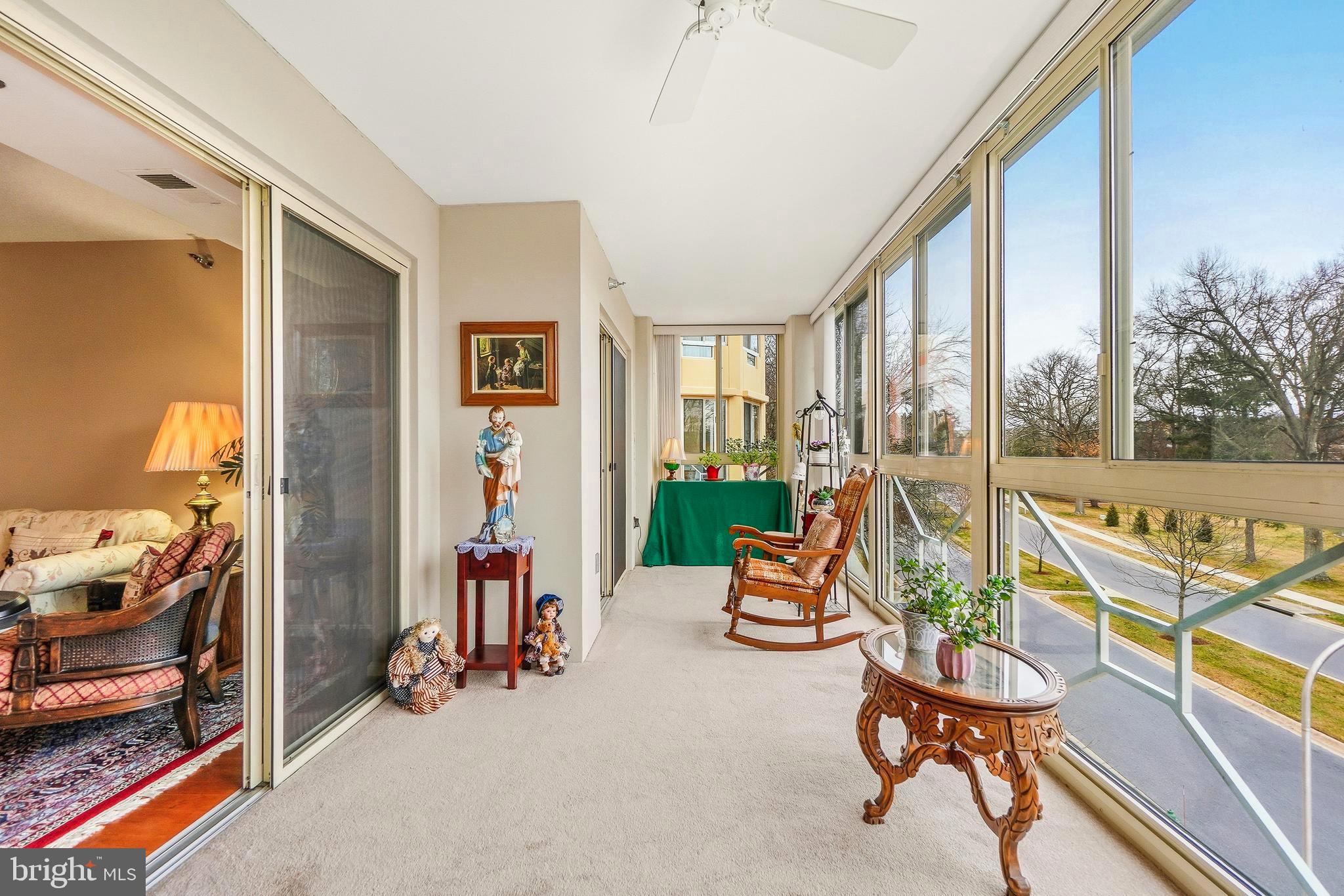 14801 Pennfield Circle, Unit 302 Silver Spring, MD 20906 - Photo 9 of 45 Ceiling fan, enter balcony from 2nd bedroom too!