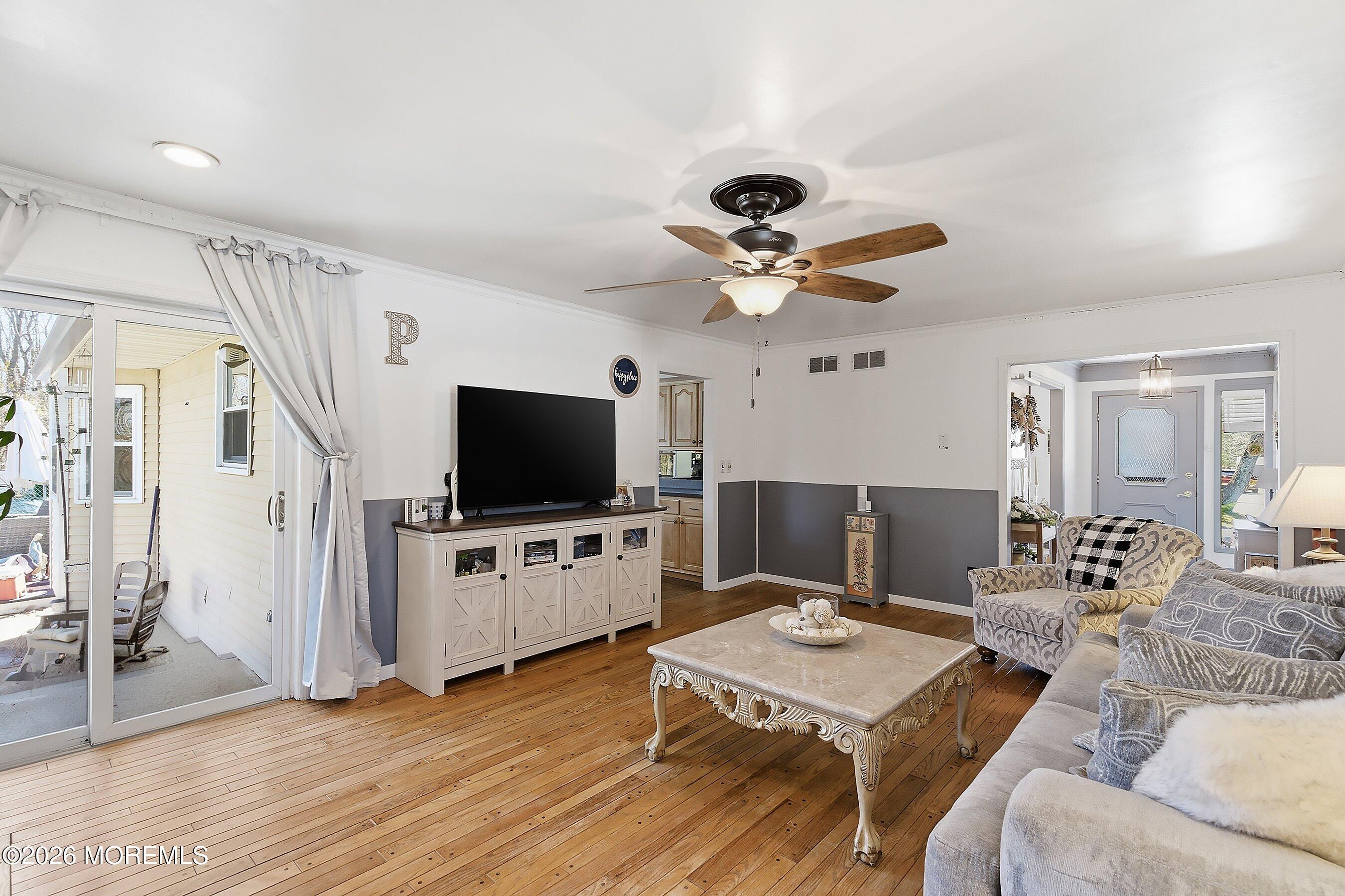 151 North Cooks Bridge Road Jackson, NJ 08527 - Photo 16 of 48 a living room with furniture and a flat screen tv