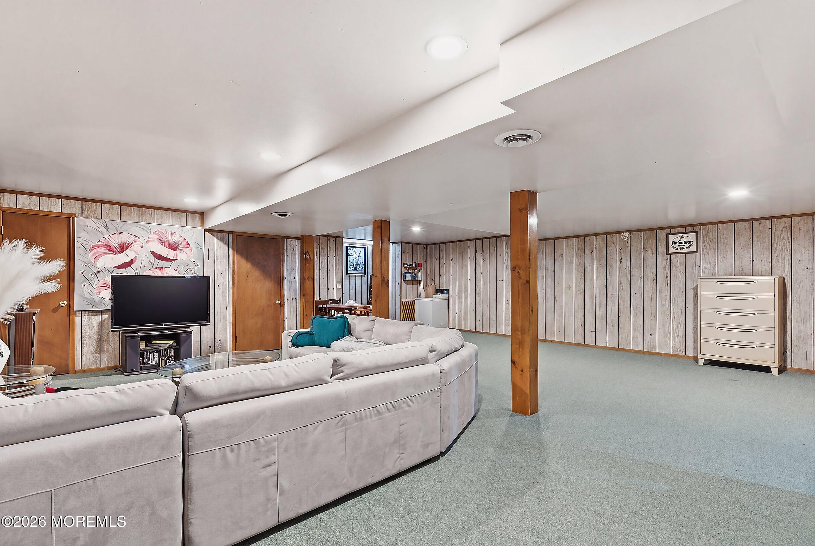151 North Cooks Bridge Road Jackson, NJ 08527 - Photo 26 of 48 a living room with furniture and a flat screen tv