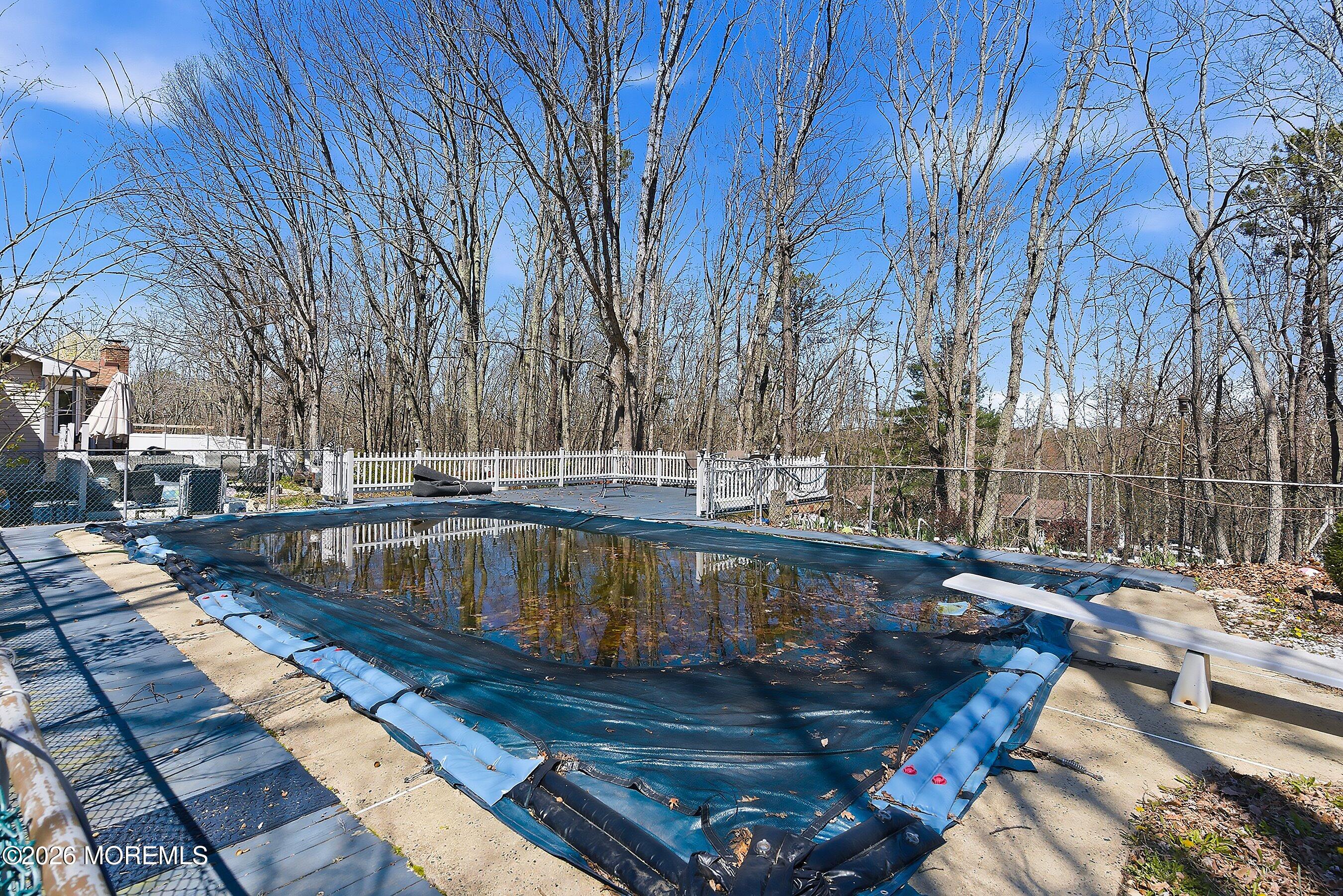 151 North Cooks Bridge Road Jackson, NJ 08527 - Photo 34 of 48 a view of swimming pool with patio