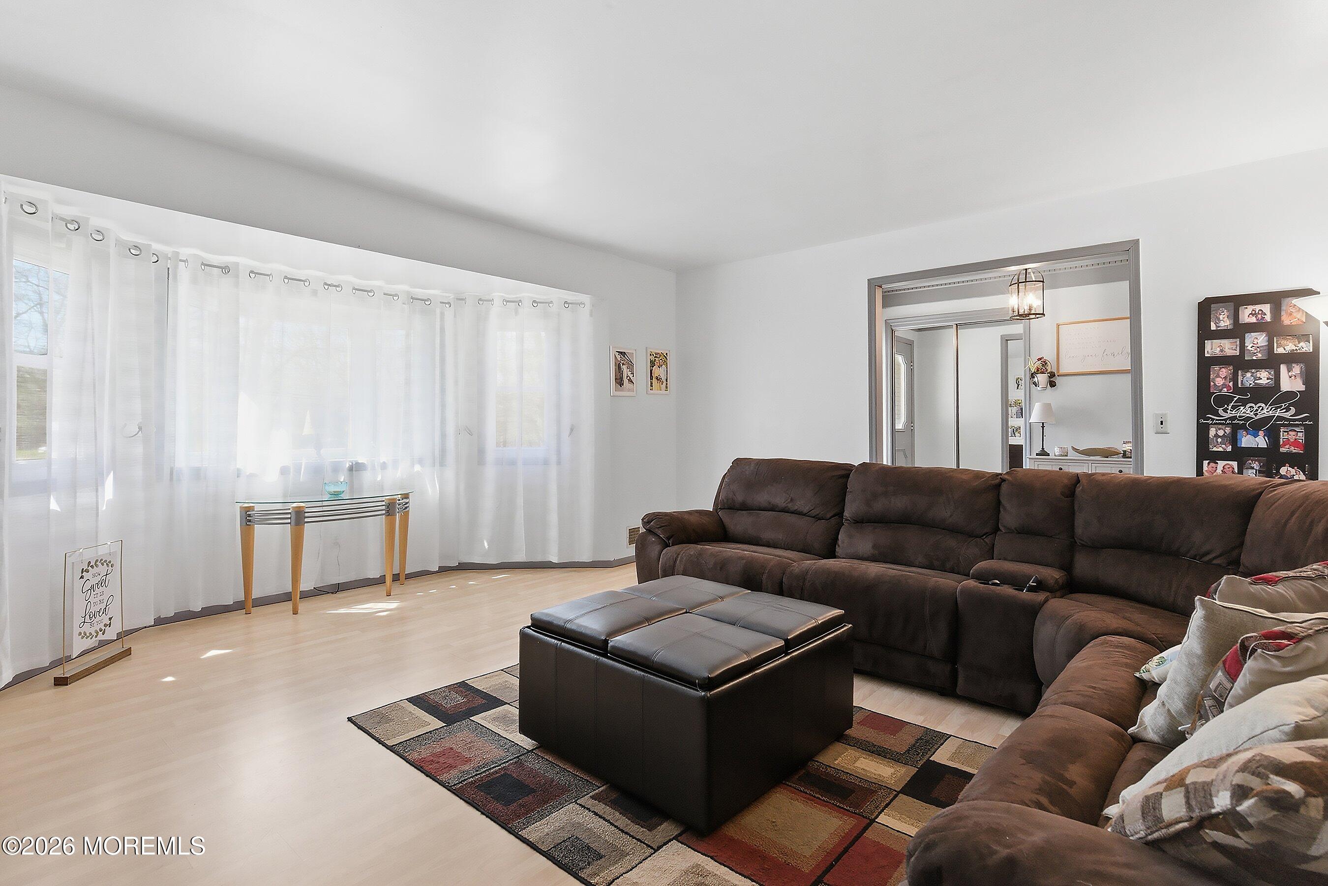 151 North Cooks Bridge Road Jackson, NJ 08527 - Photo 5 of 48 a living room with furniture and a window