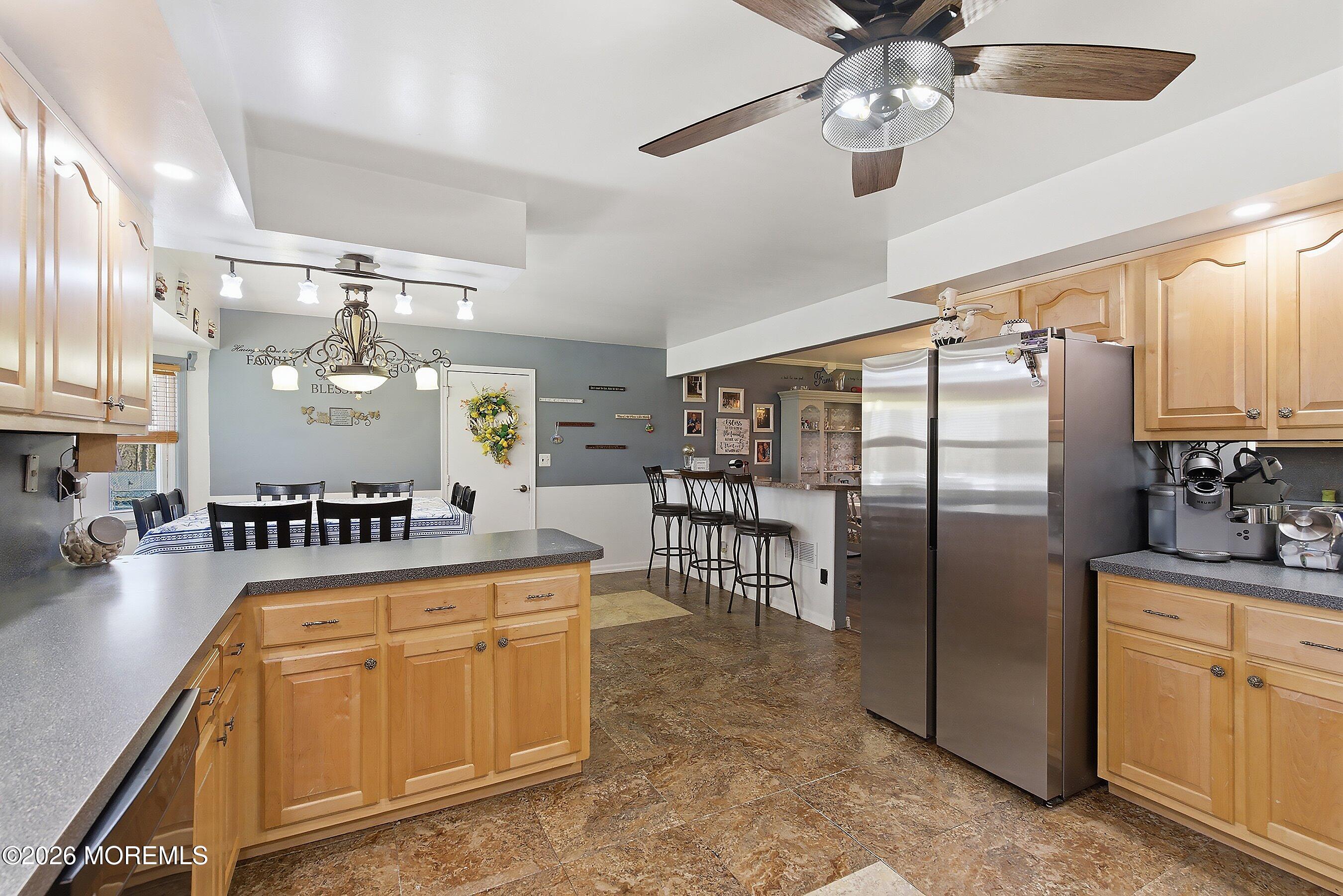 151 North Cooks Bridge Road Jackson, NJ 08527 - Photo 9 of 48 a kitchen with stainless steel appliances granite countertop a refrigerator a sink dishwasher a oven with white cabinets and wooden floor