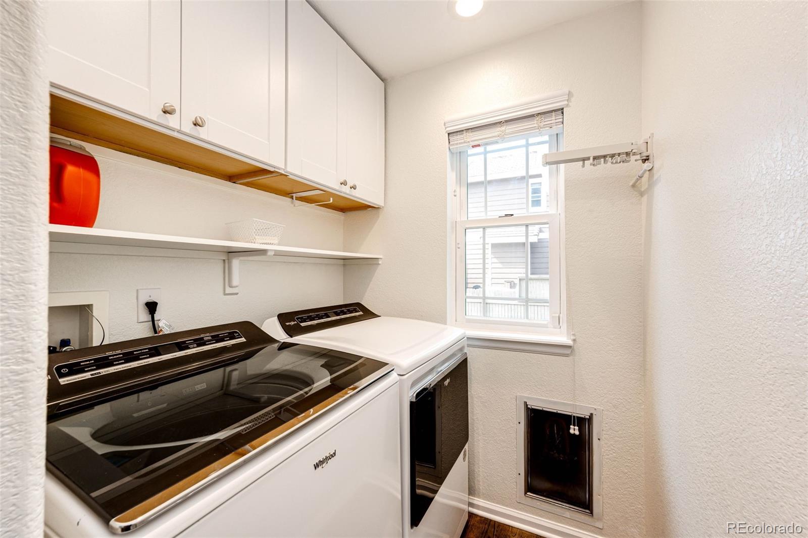 645 Springvale Road Castle Rock, CO 80104 - Photo 15 of 41 a utility room with dryer and washer
