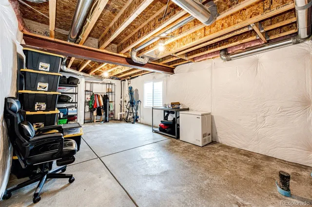 a view of a garage with furniture