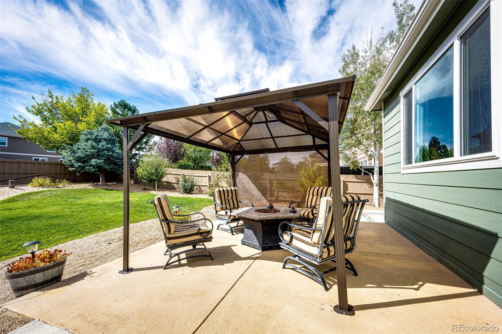 645 Springvale Road Castle Rock, CO 80104 - Photo 30 of 41 a view of backyard with sitting area