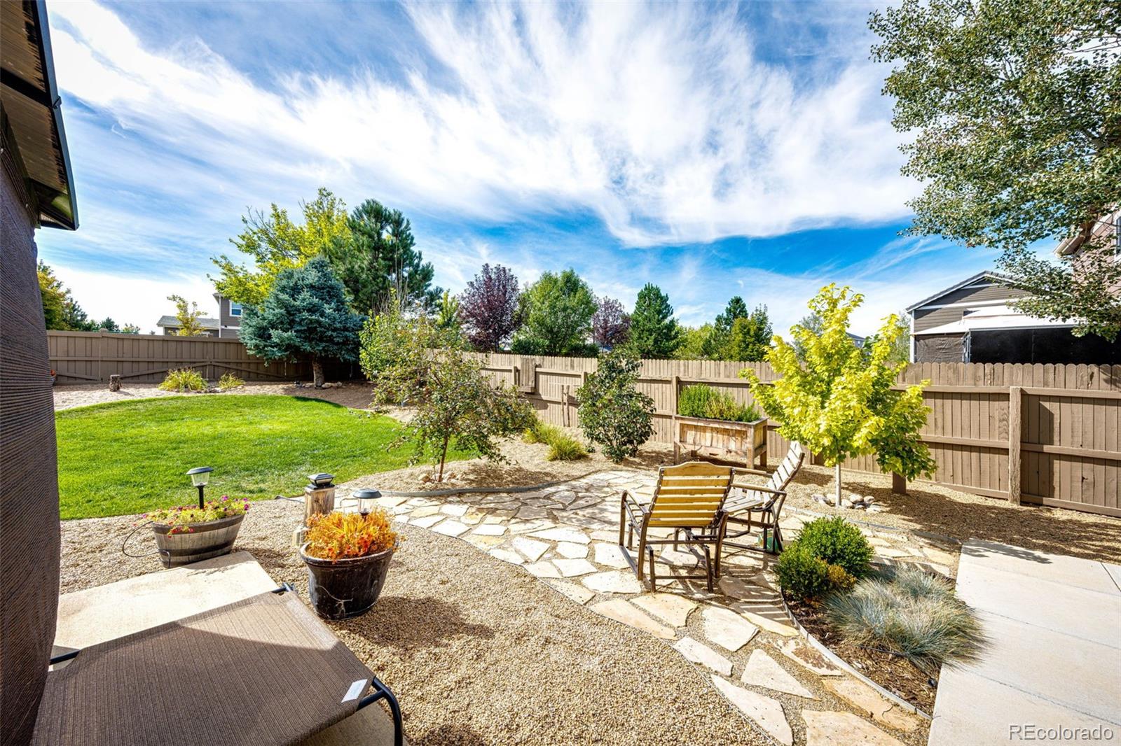 645 Springvale Road Castle Rock, CO 80104 - Photo 33 of 41 a view of a swimming pool and lounge chairs