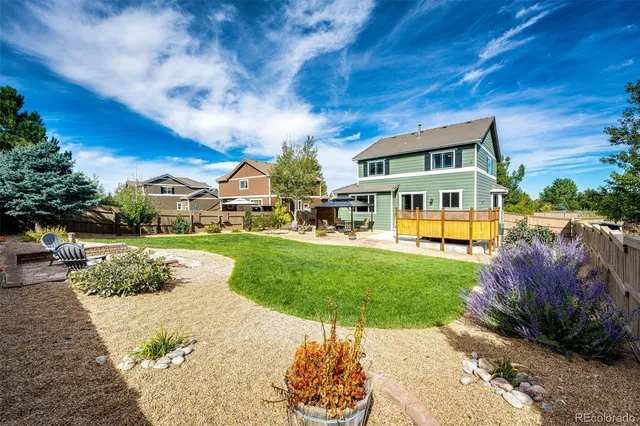 a view of a house with a garden