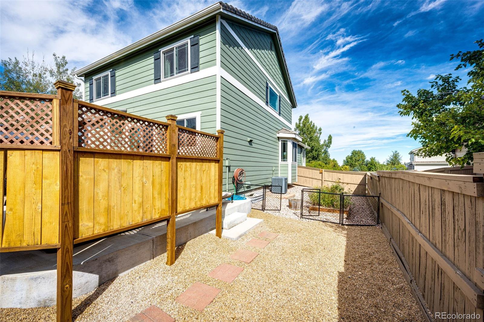 645 Springvale Road Castle Rock, CO 80104 - Photo 37 of 41 a view of a house with a patio