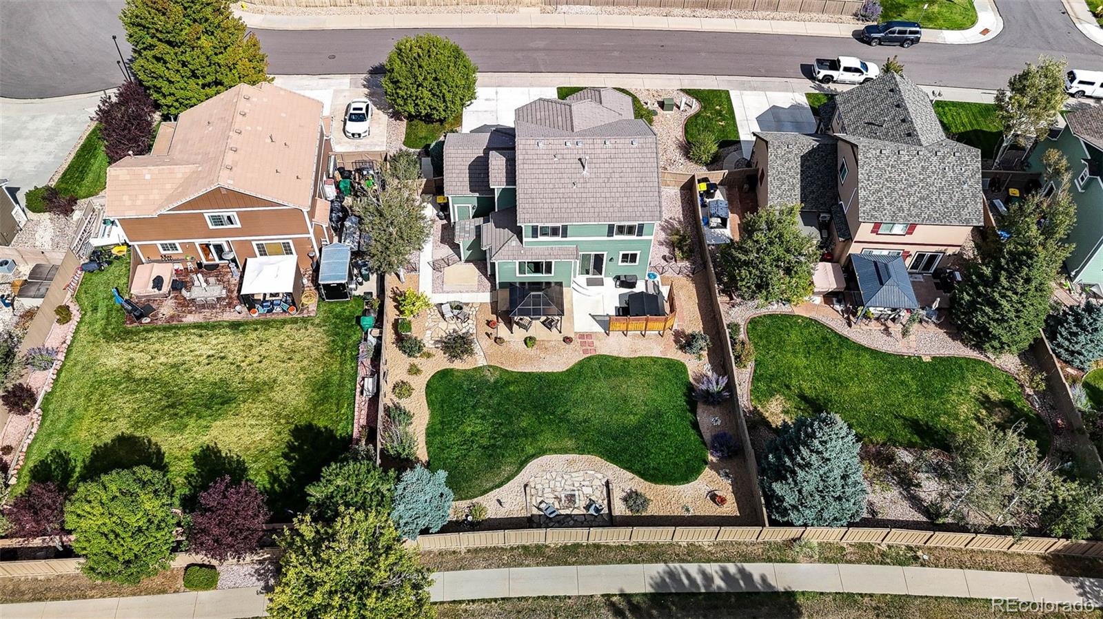 645 Springvale Road Castle Rock, CO 80104 - Photo 40 of 41 an aerial view of a house with a garden and a garage
