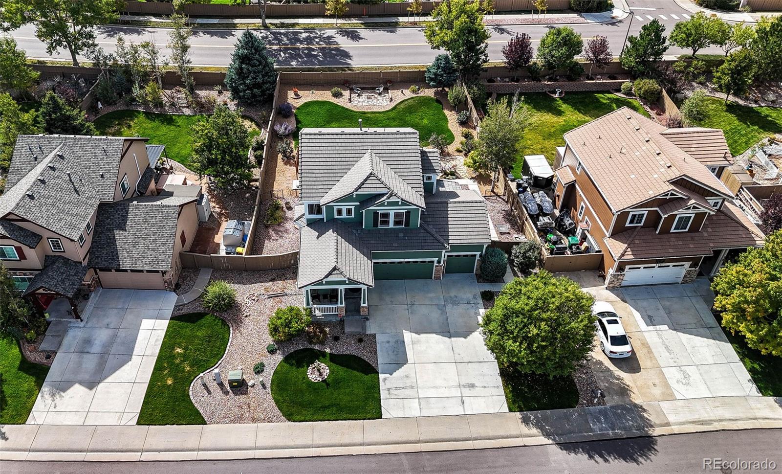 645 Springvale Road Castle Rock, CO 80104 - Photo 4 of 41 an aerial view of multiple houses with yard