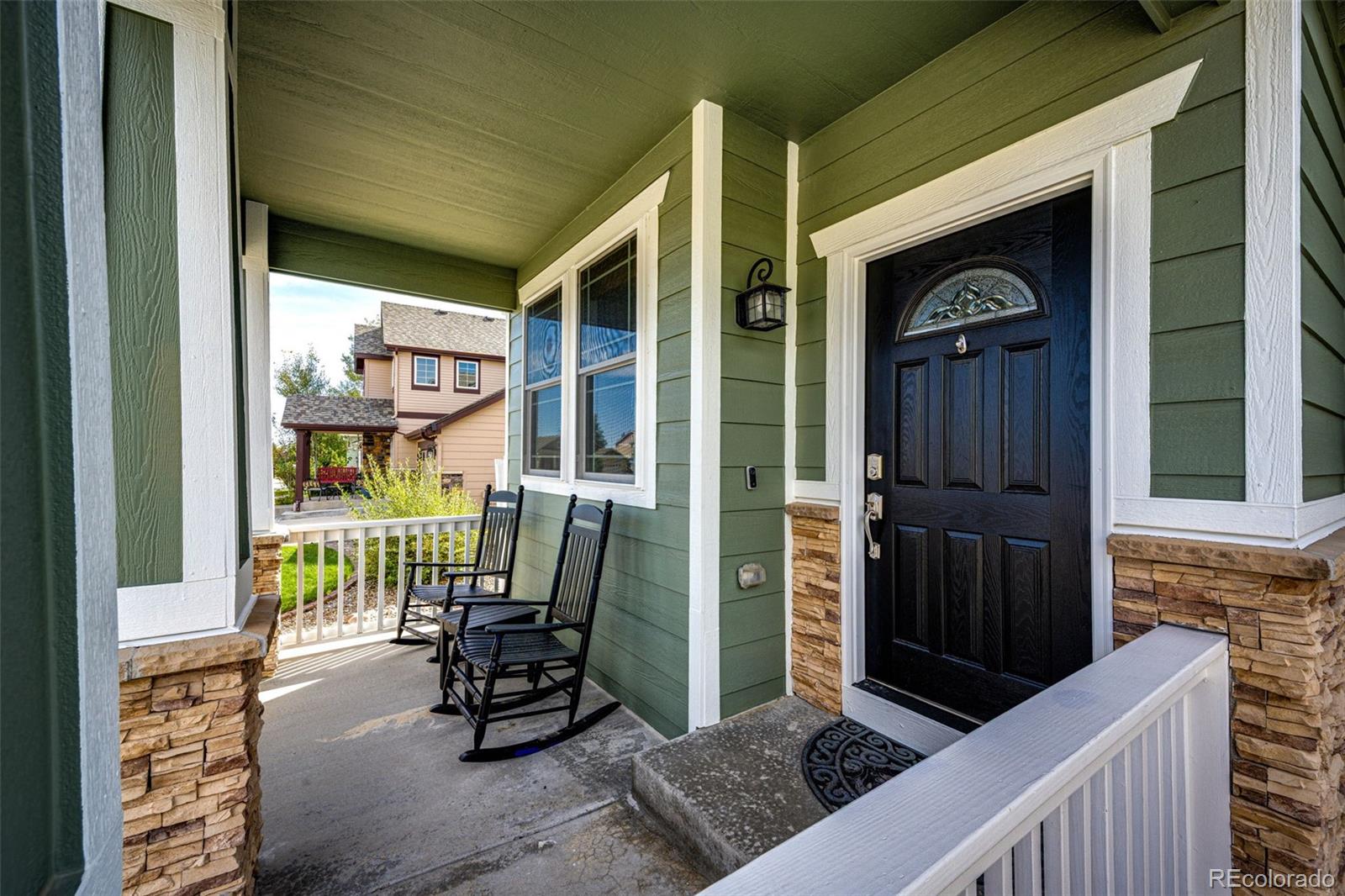 645 Springvale Road Castle Rock, CO 80104 - Photo 5 of 41 a view of two chairs in the balcony