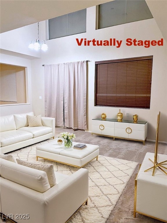 7640 Sierra Paseo Lane Las Vegas, NV 89128 - Photo 18 of 49 Carpeted living room featuring a chandelier