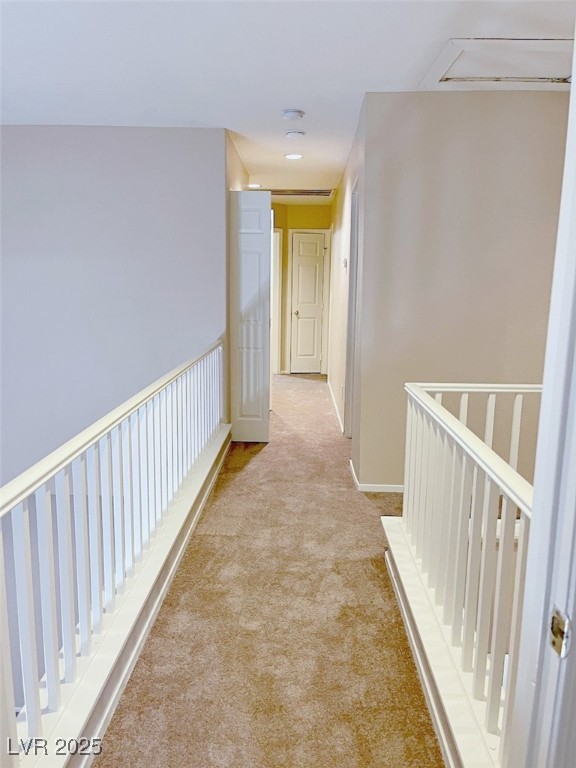 7640 Sierra Paseo Lane Las Vegas, NV 89128 - Photo 29 of 49 Corridor with light colored carpet and an upstairs landing