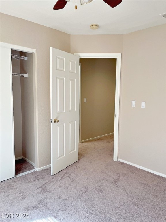 7640 Sierra Paseo Lane Las Vegas, NV 89128 - Photo 45 of 49 Unfurnished bedroom with carpet flooring, a ceiling fan, and a closet