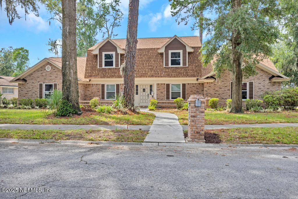 4448 Charter Point Boulevard Jacksonville, FL 32277 - Photo 1 of 47 front view of house with a yard