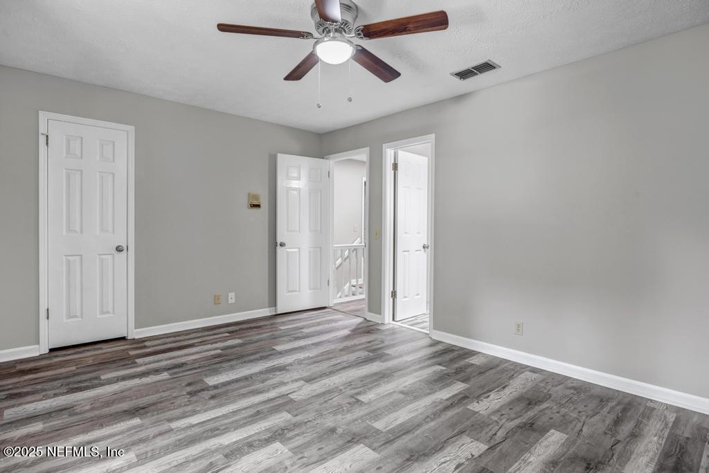 4448 Charter Point Boulevard Jacksonville, FL 32277 - Photo 40 of 47 a view of empty room with a ceiling fan
