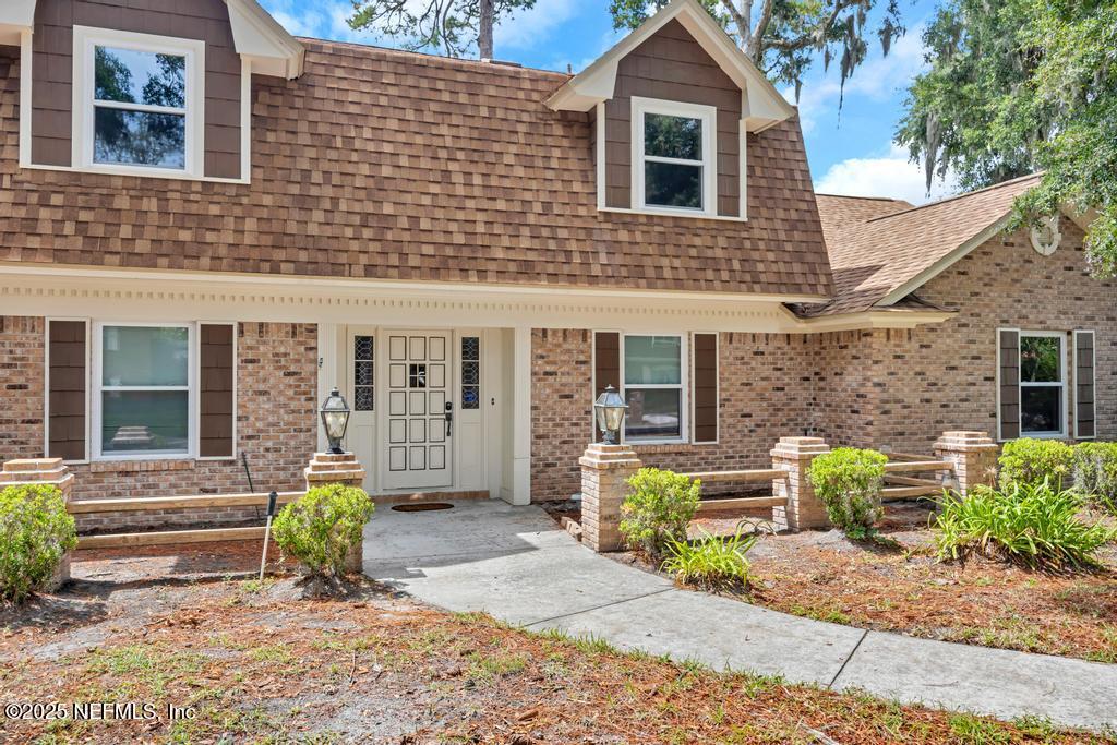 4448 Charter Point Boulevard Jacksonville, FL 32277 - Photo 6 of 47 a front view of a house with patio