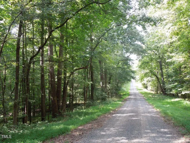 a view of road with trees