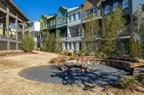 a view of a building with a yard