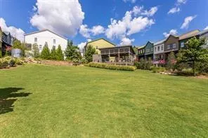 a front view of a building with a big yard