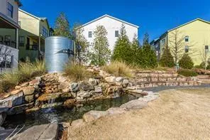 a view of swimming pool from a yard