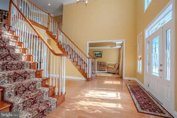 a living room with furniture or couch and a flat screen tv